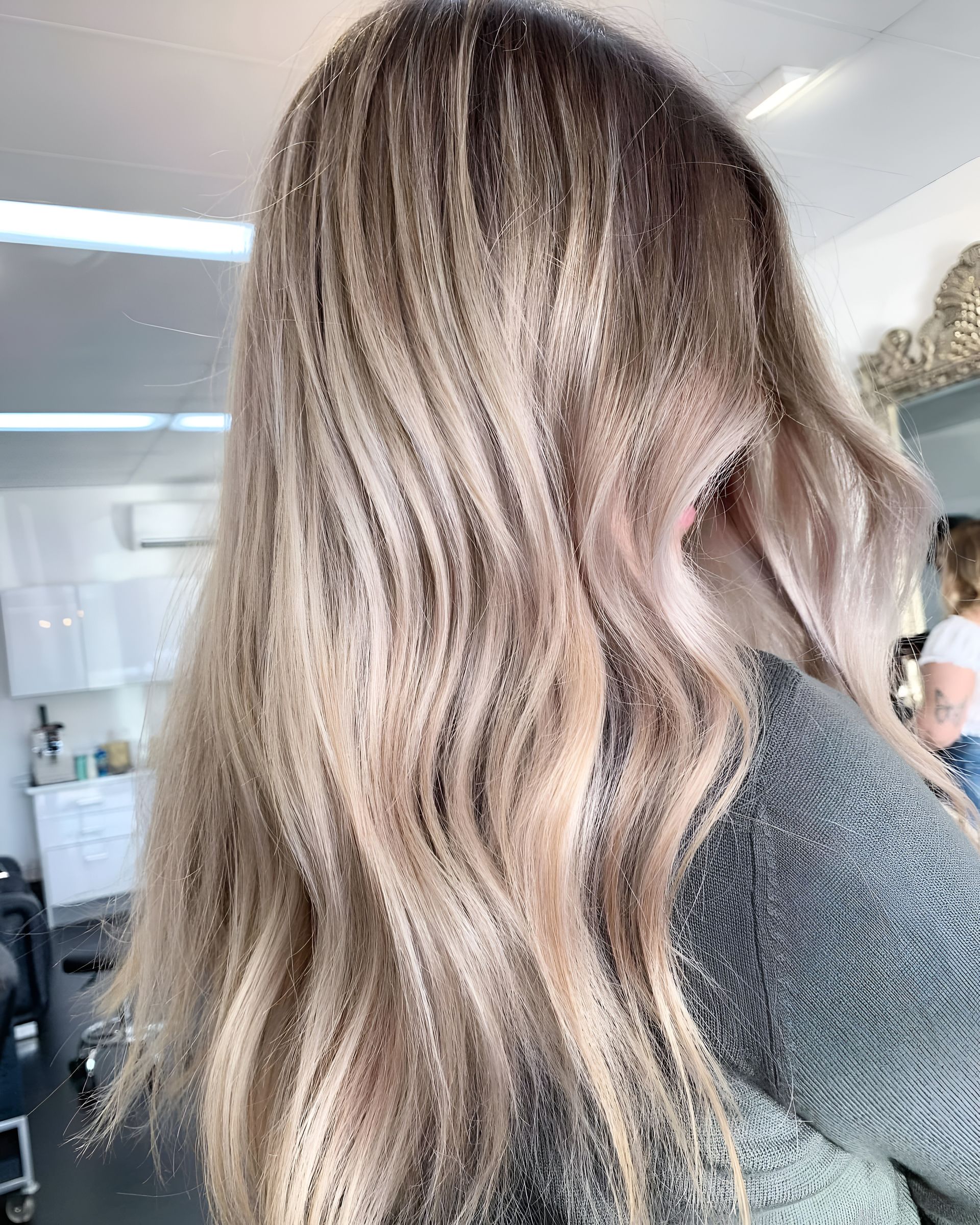 Woman With Wavy, Light Brown and Blonde Hair in a Salon — 5th Ave Hair Lounge in Caloundra, QLD