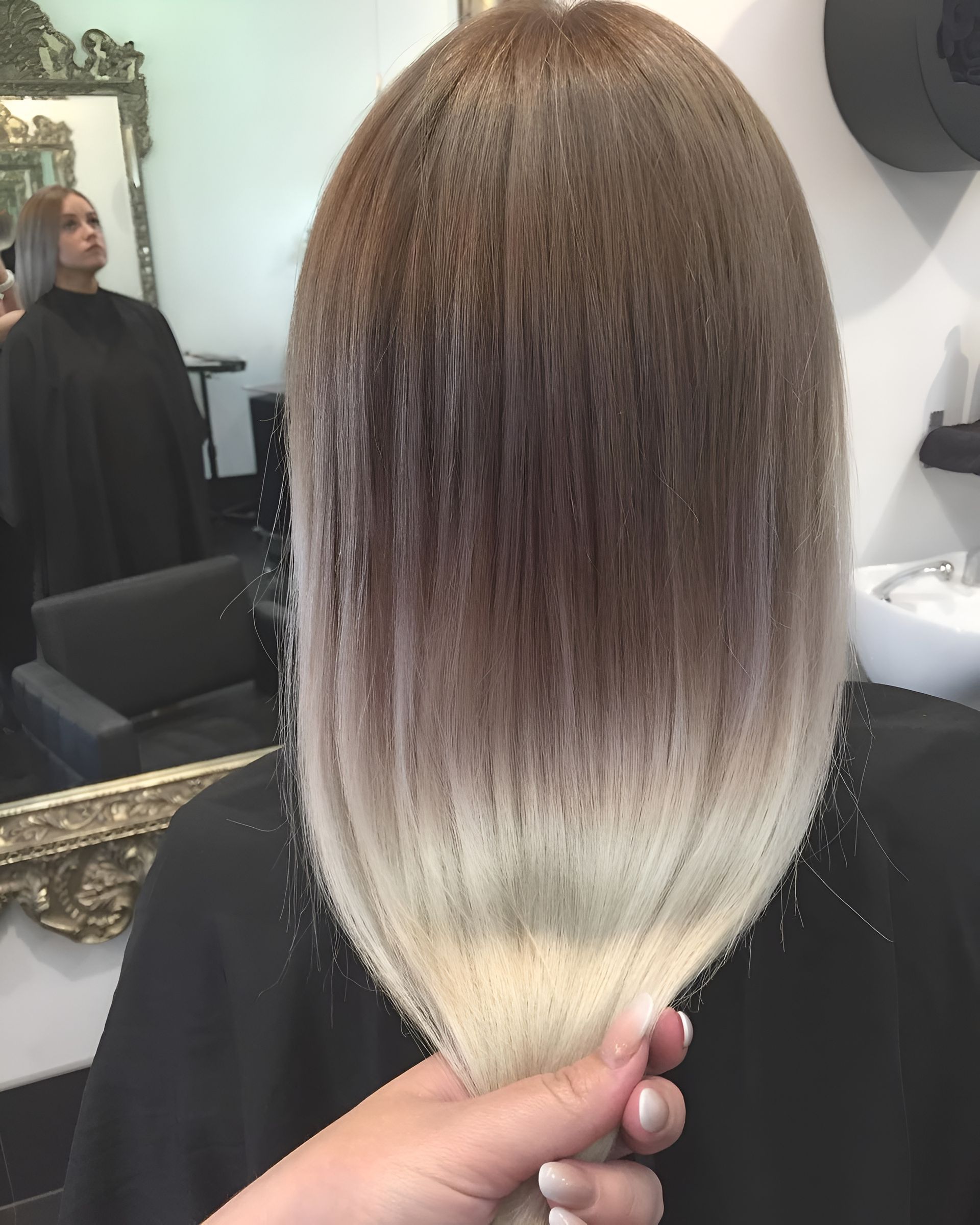Hair With Brown to Blonde Ombre, Being Held by Hand in Salon — 5th Ave Hair Lounge in Caloundra, QLD