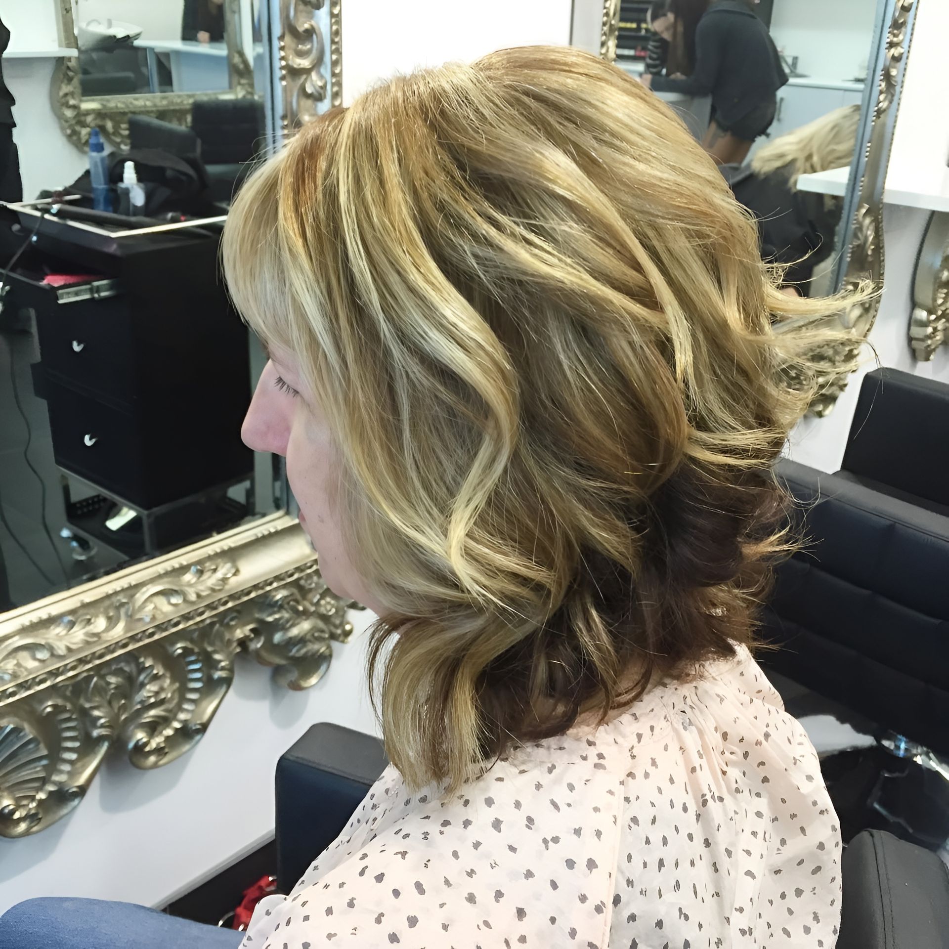 Woman With Layered Blonde and Brown Hair, in a Salon Chair — 5th Ave Hair Lounge in Caloundra, QLD