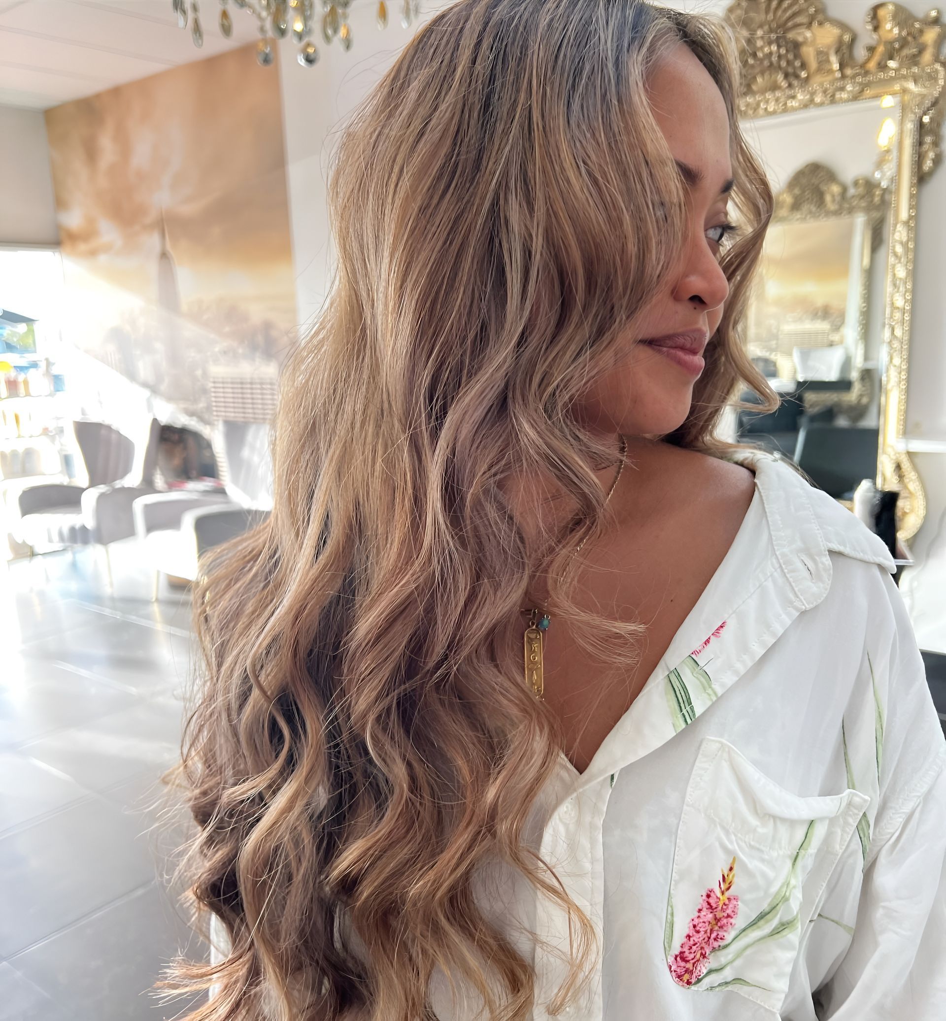 Woman With Wavy, Light Brown Hair Wearing a White Shirt — 5th Ave Hair Lounge in Caloundra, QLD