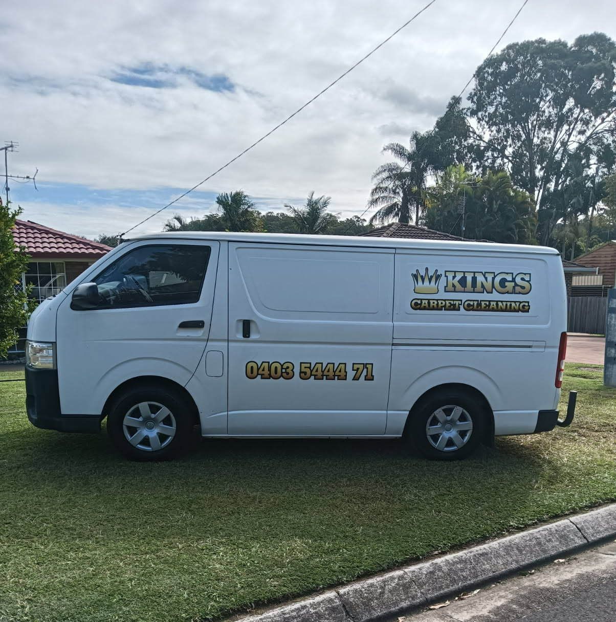 A White Van is Parked on the Side of the Road — King’s John Carpet Kleaning & Pest Control Service In Mooloolaba, QLD