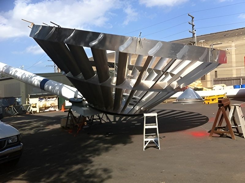 A Large Metal Structure With A Ladder In Front Of It — Brumb's Welding & Fabrication in Biggera Waters, QLD