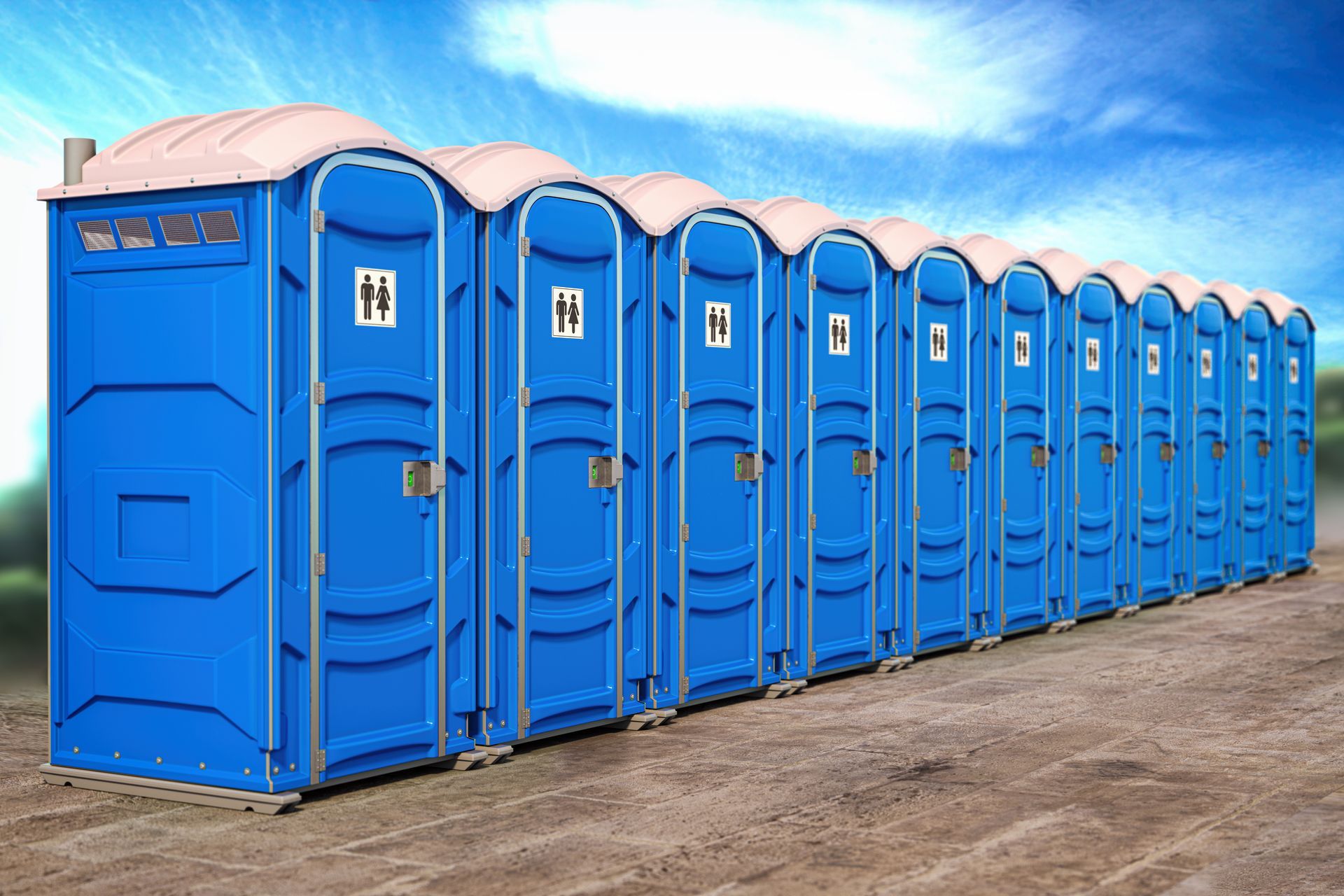 Portable plastic toilets in a row. Portable plastic toilets in a row.