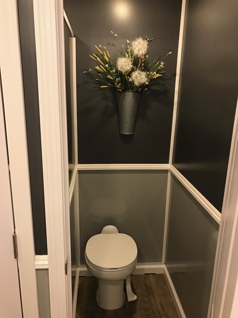 Restroom Trailer With Flowers On The Wall — Albuquerque, NM — AAA Pumping Service Inc.