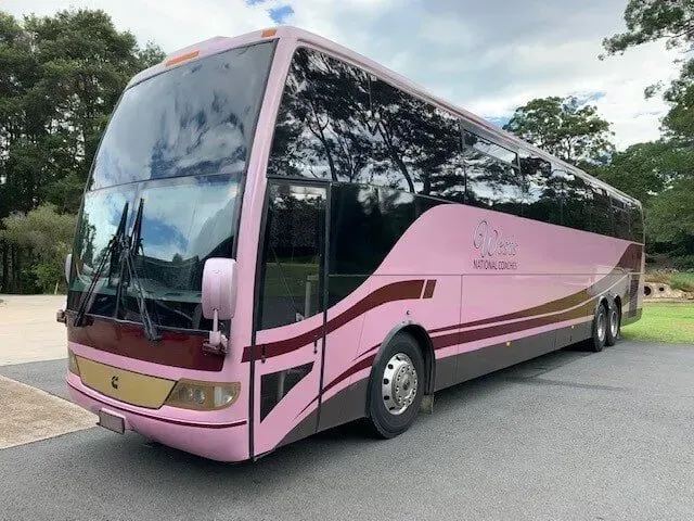 A Row of White Buses Are Parked in a Parking Lot — Wests National Coaches In Chevallum, QLD