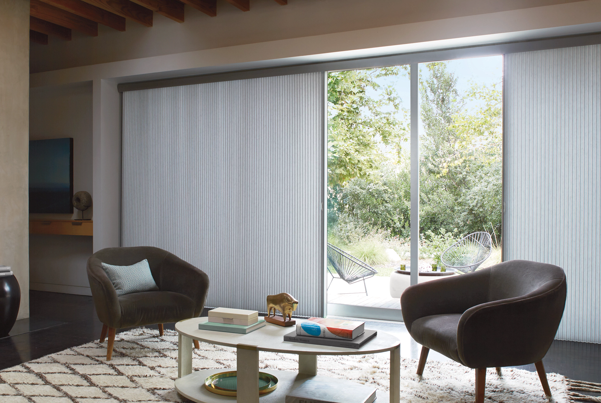Hunter Douglas Duette® Cellular Shades covering a sliding glass door.