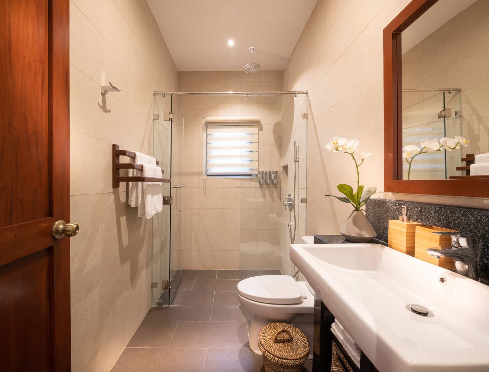 Ensuite bathroom with rain shower in Bedroom 5 at Pure Shores Villa Bohol Philippines