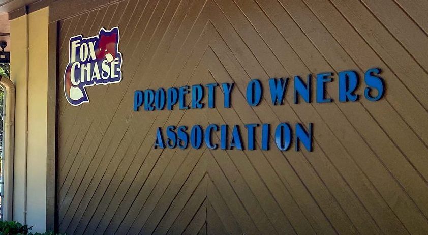 a sign for the fox chase property owners association