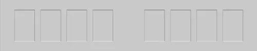 Light gray wall with eight narrow rectangular panels or window slits in two groups