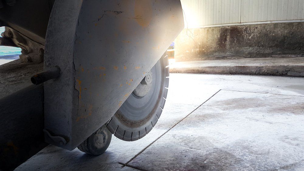 Cutting Concrete Floor With Diamond Blade — Concrete Sawing in Bundaberg, QLD