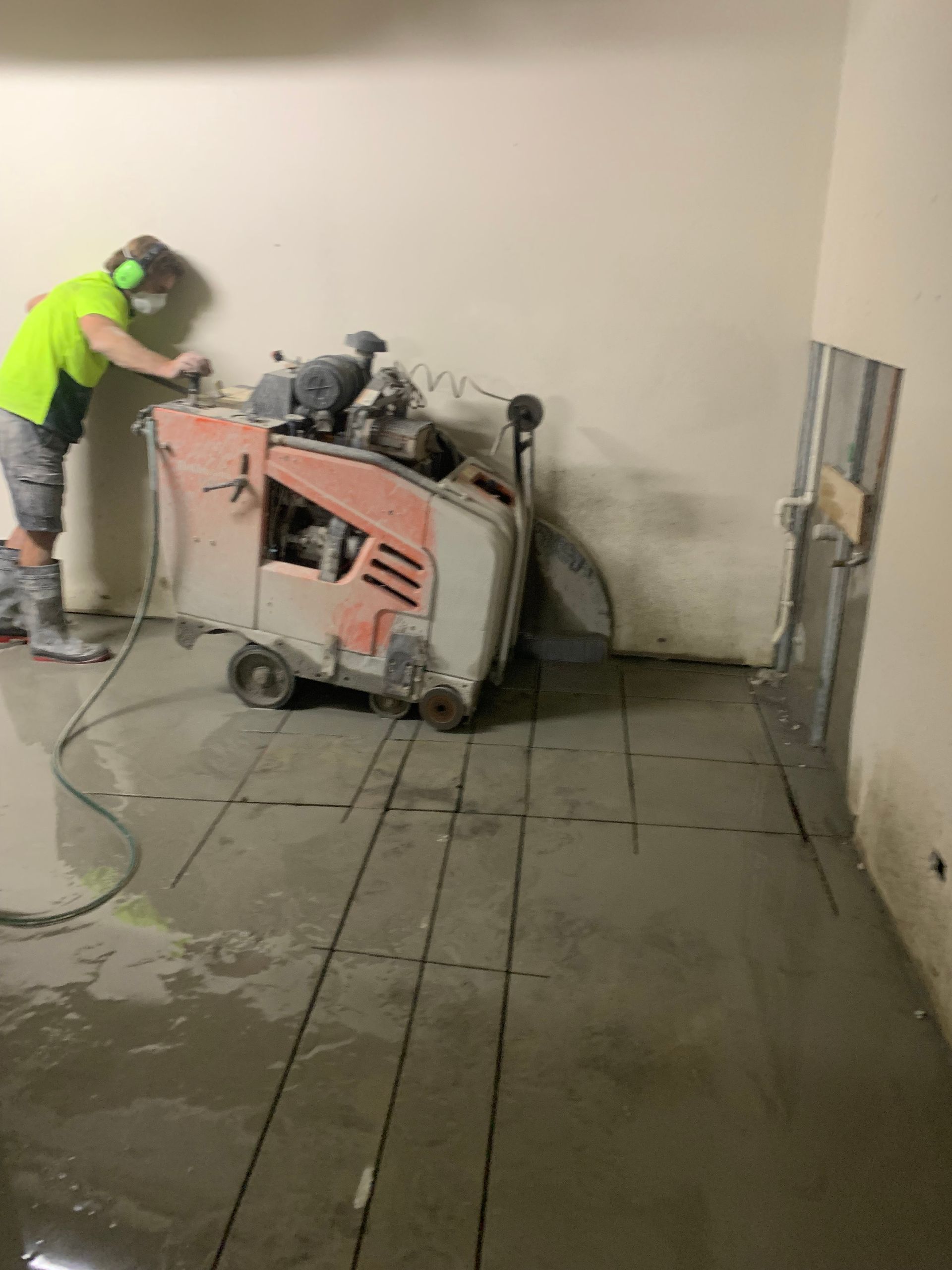 Concrete Cutter Machine Cutting the Cement Floor— Concrete Cutting in Fraser Coast, QLD