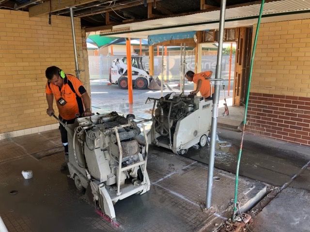 Workers Sawing  Floor — Road & Floor Sawing in Bundaberg, QLD