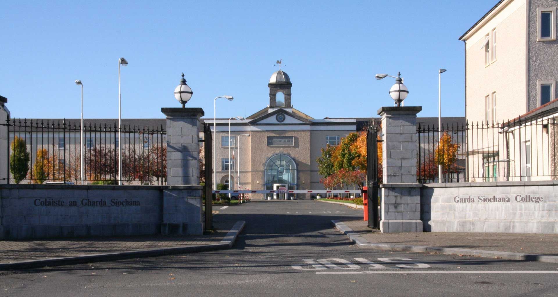 A large building with a gate in front of it
