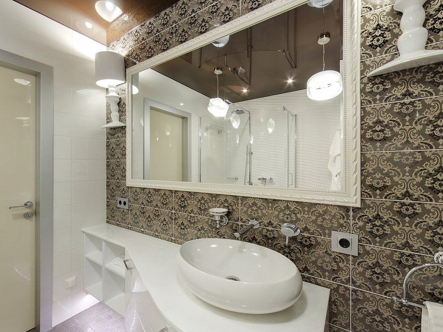 bathroom with mirror and lighting