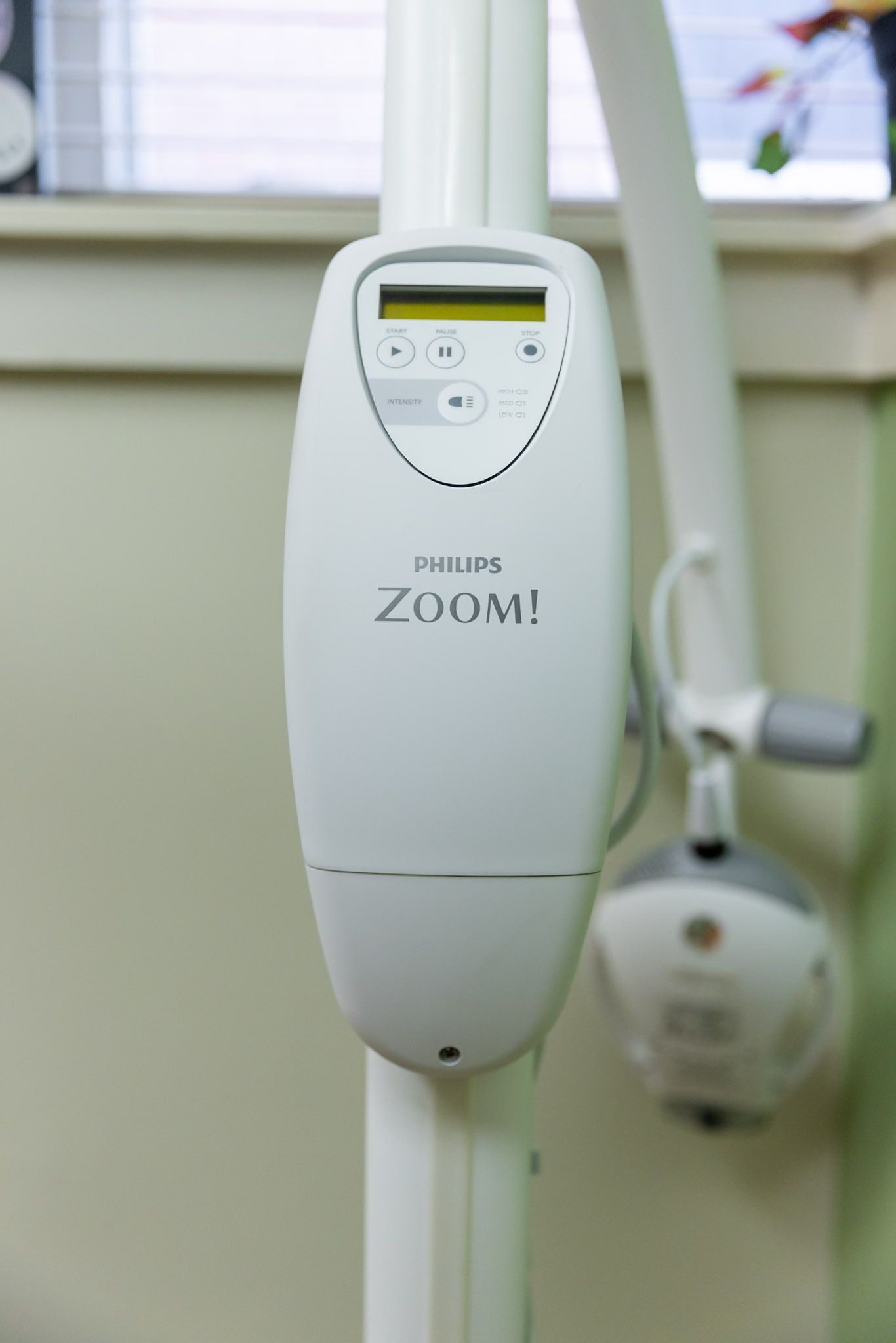 Zoom! teeth whitening machine in a clinic, white device on a stand