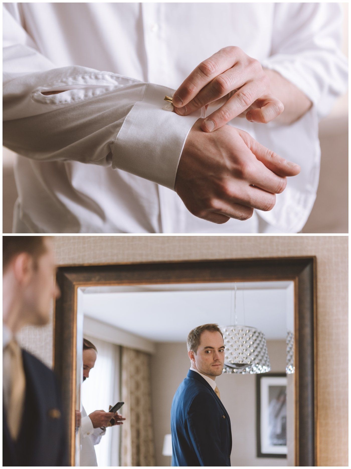 Close-up of someone buttoning a white shirt cuff, with a man reflected in a mirror below.
