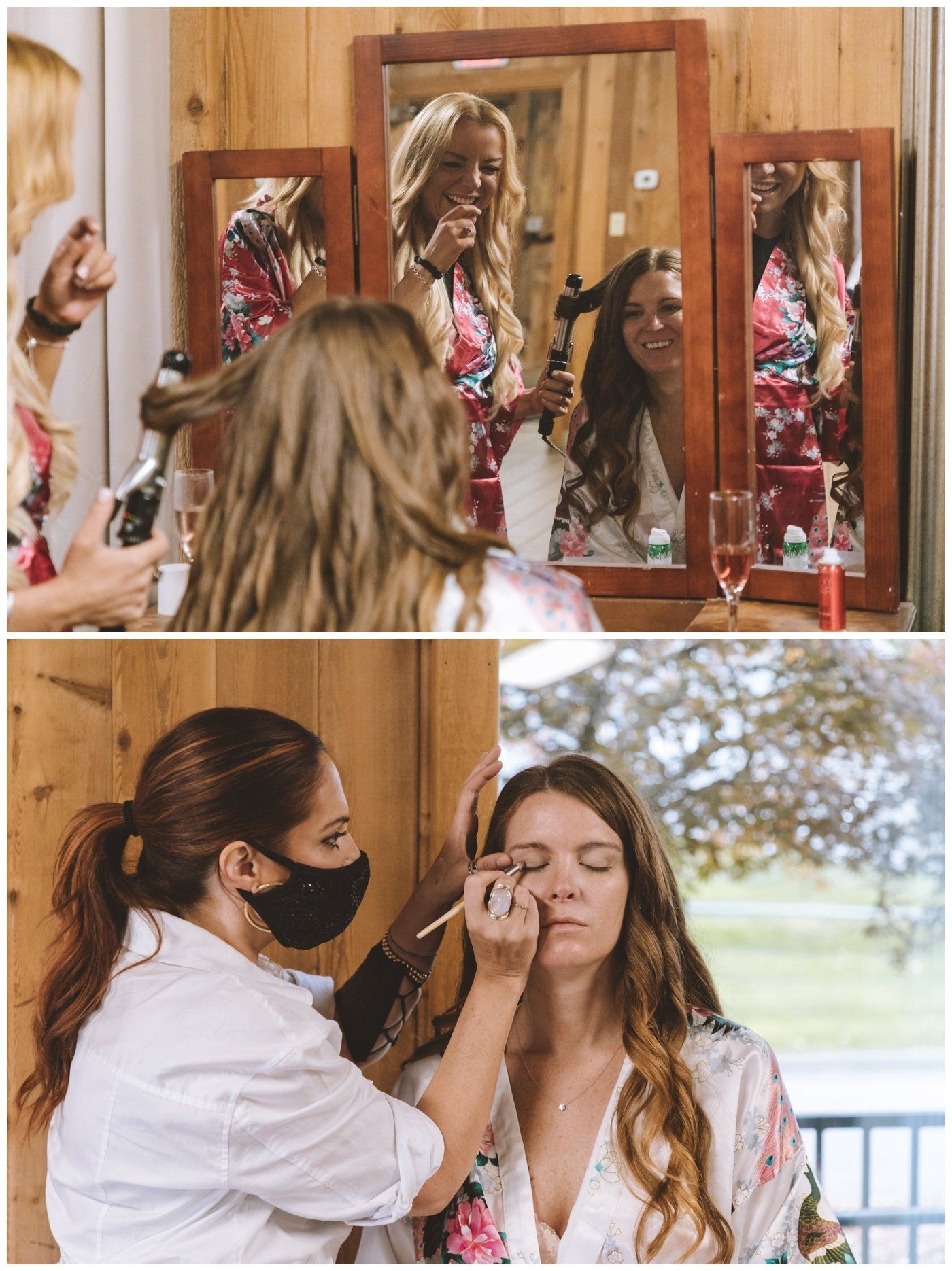 Woman applies makeup to bride in front of mirror, with makeup session outdoors nearby.