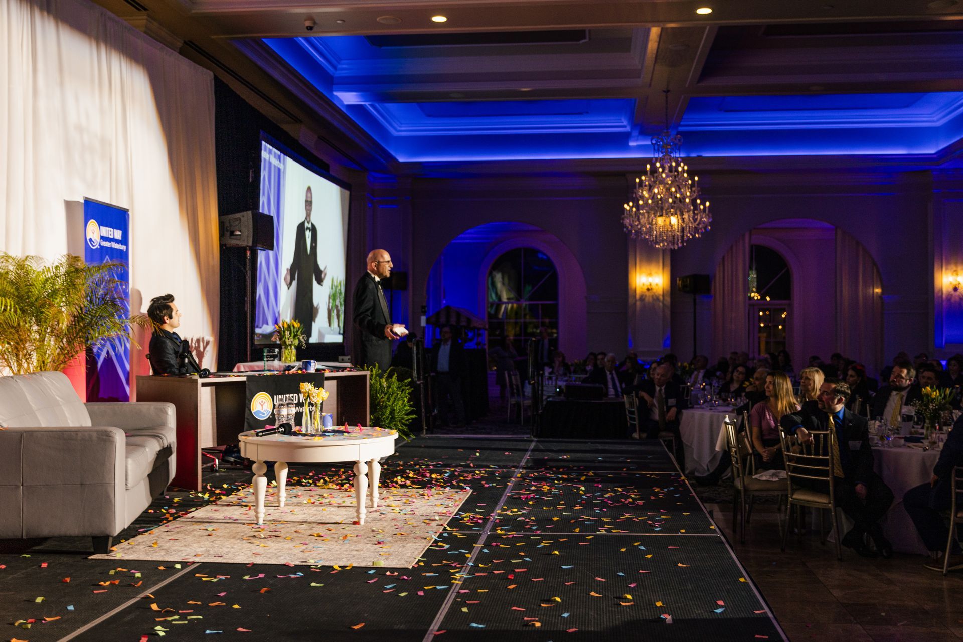 Stage view of United Way Greater Waterbury 38th Award Ceremony with a late-night talk show theme.