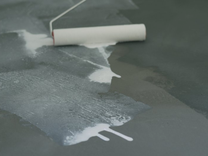 Applying Sealant In A Concrete Floor — Concrete Sealer in Sunshine Coast, QLD