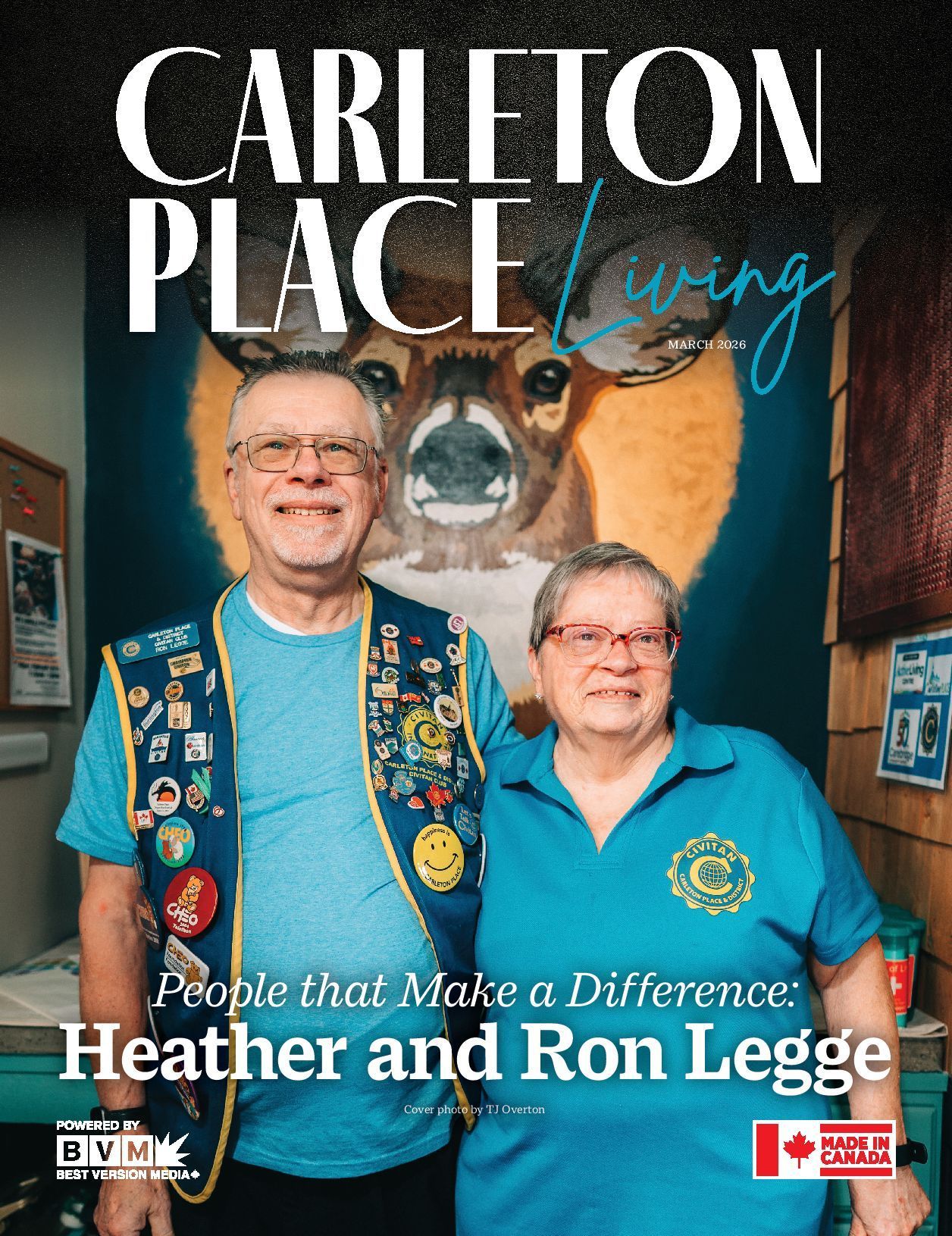 Heather and Ron Legge smiling in turquoise shirts, featured on a Carleton Place Living cover