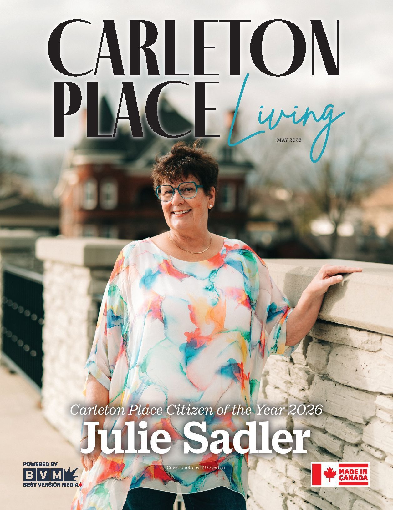Carleton Place Living magazine cover featuring Julie Sadler standing outdoors by a stone wall