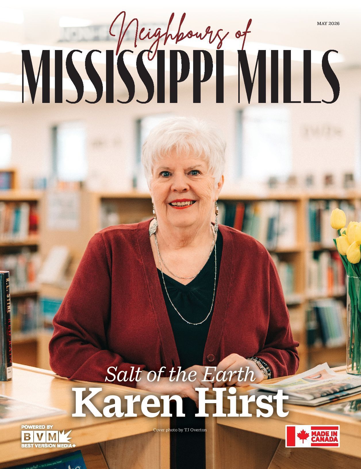 Magazine cover with a smiling woman in a red sweater, titled “Mississippi Mills” and “Salute the Earth Karen Hirst.”