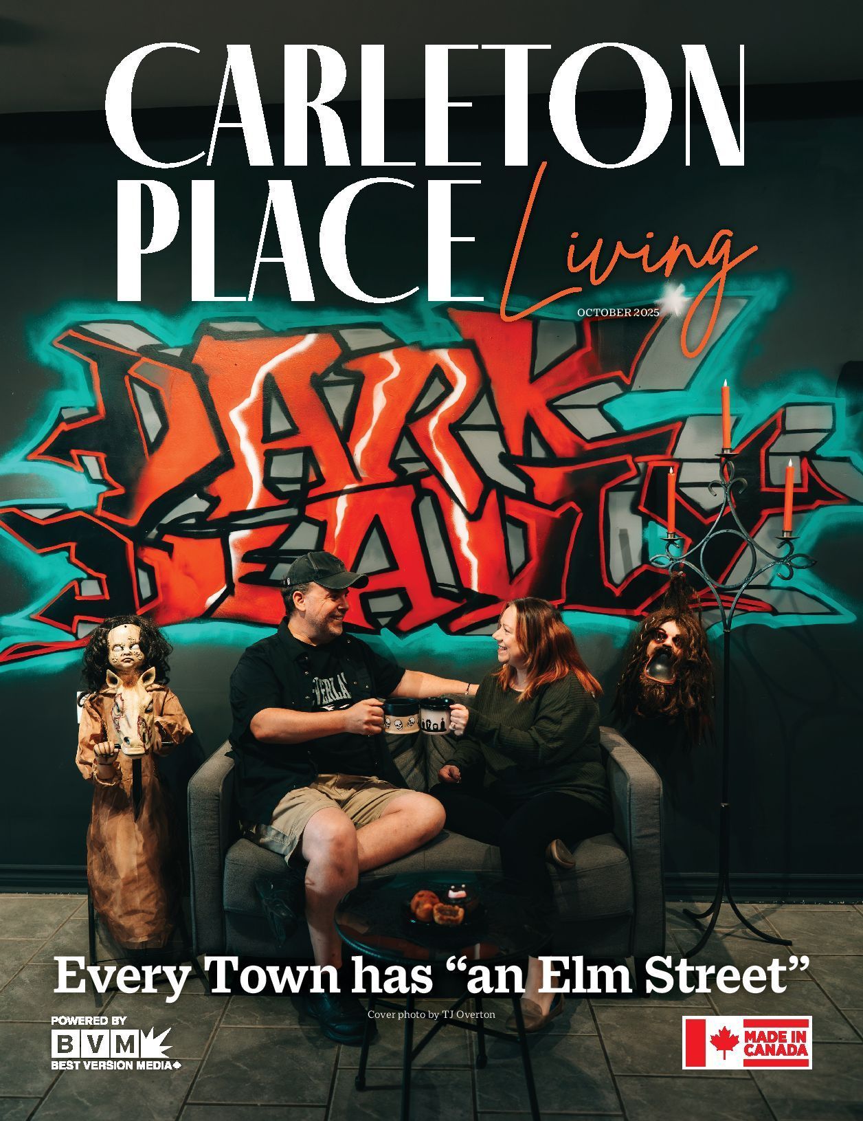 Three people in front of a graffiti wall with “Dark Alley” and “Every Town has an Elm Street” text.