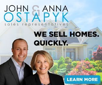 John and Anna Ostapyk real estate ad with smiling agents, house background, and “We Sell Homes. Quickly.” text