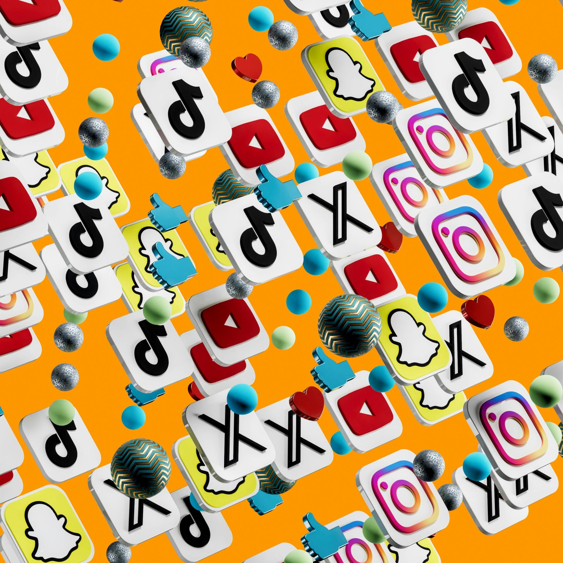 A seamless pattern of social media icons on an orange background