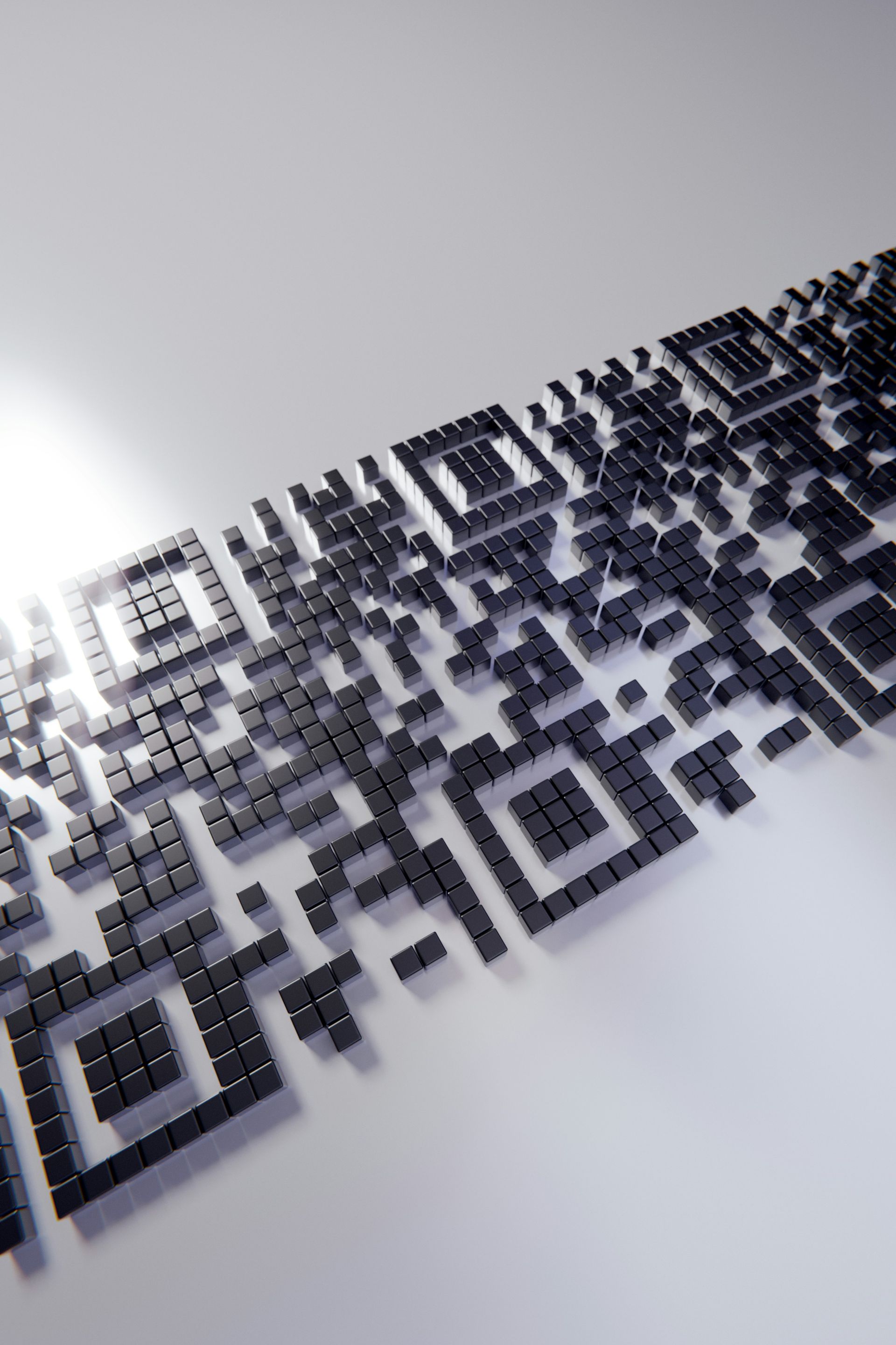 A close up of a qr code on a white surface