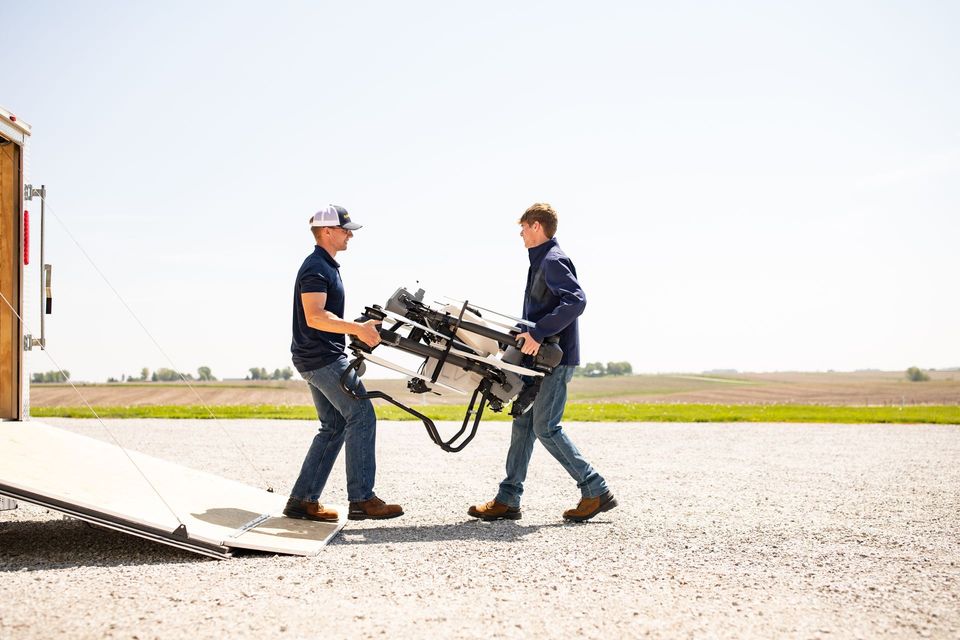 Operators carrying DJI T50