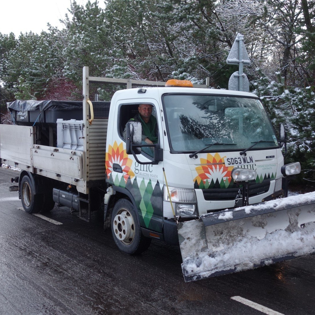 Winter gritting tractor