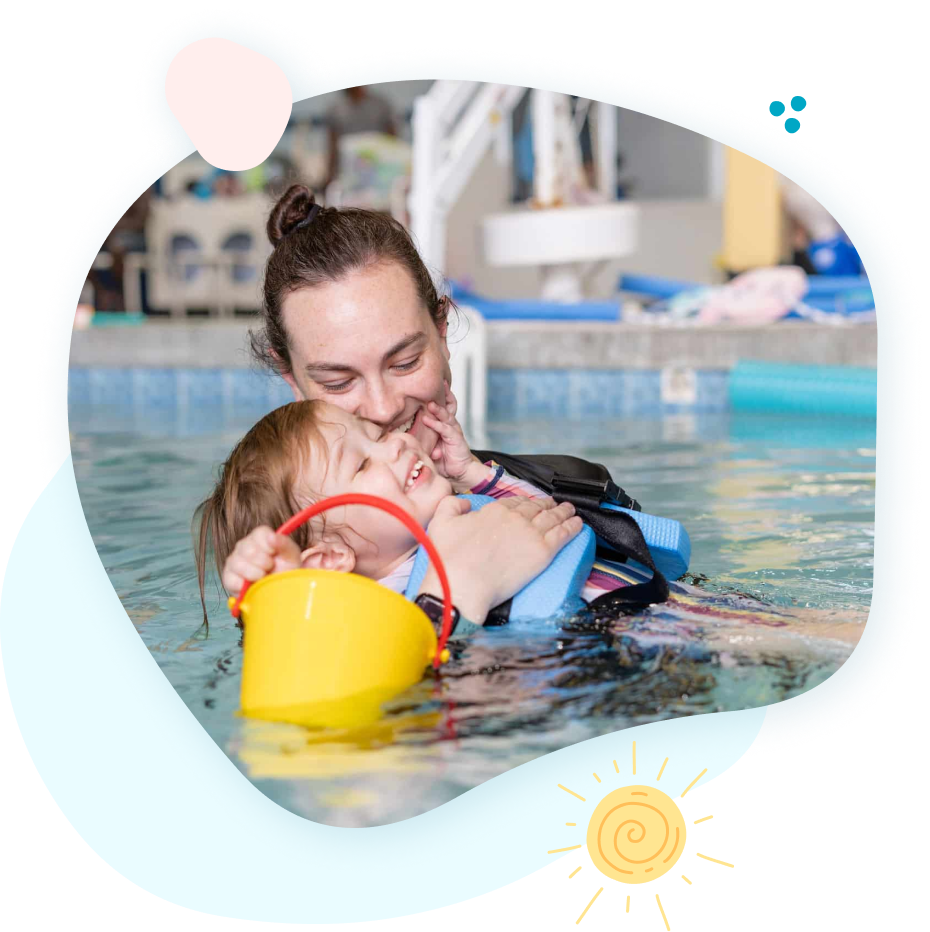 A woman is teaching a child how to swim in a swimming pool.