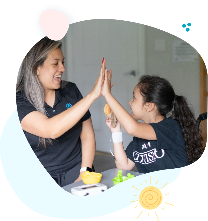A woman and a child are giving each other a high five.