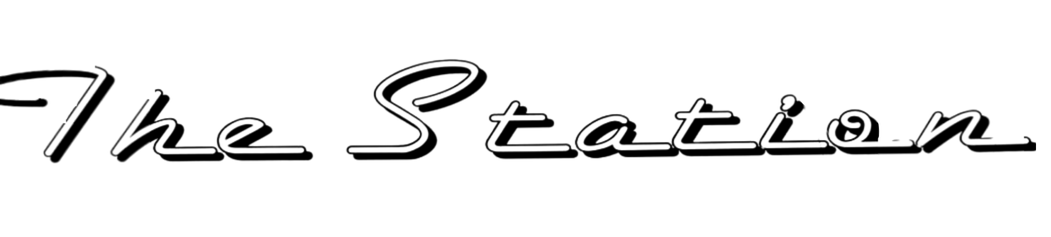 The Station logo in cursive with a metallic finish.