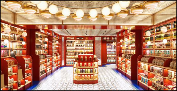 Mercato Centrale in Grand Central Terminal by The Rockwell Group, featuring red wooden shelving units stocked with gourmet Italian goods, a central display island, patterned floor tiles, and warm overhead globe lighting.