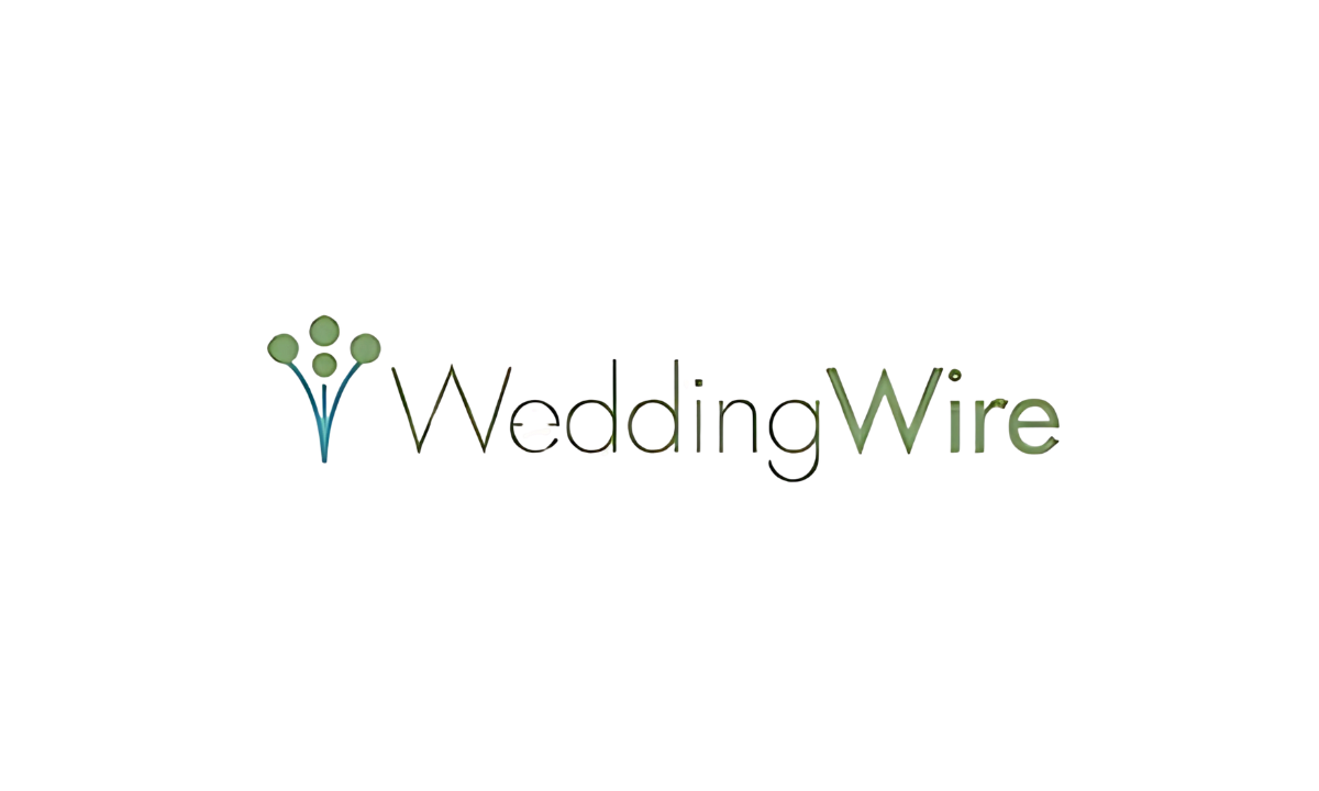 A logo for wedding wire with a tree in the background.