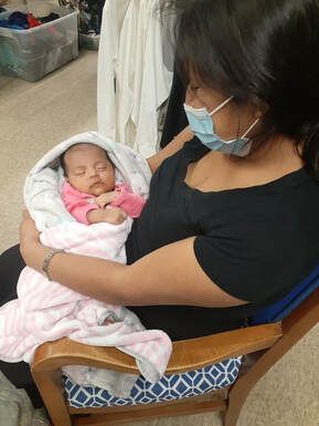 Woman holding baby