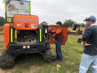 Man Checking Tractor — Plant Operator Courses Central Coast 