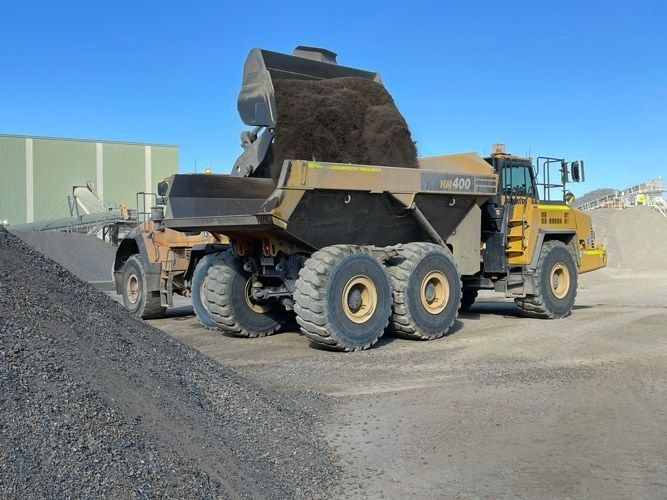 Dump Truck Being Loaded With Dirt — Verification of Competency Port Stephens