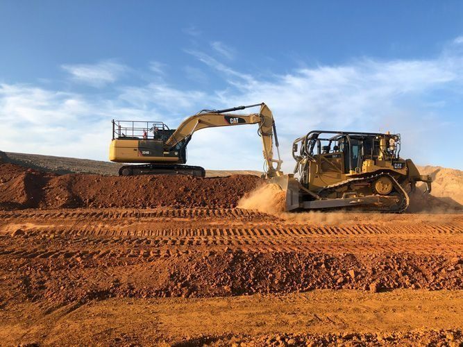 Two bulldozers on a dirt field, ready for heavy-duty work — Verification of Competency Hunter Region