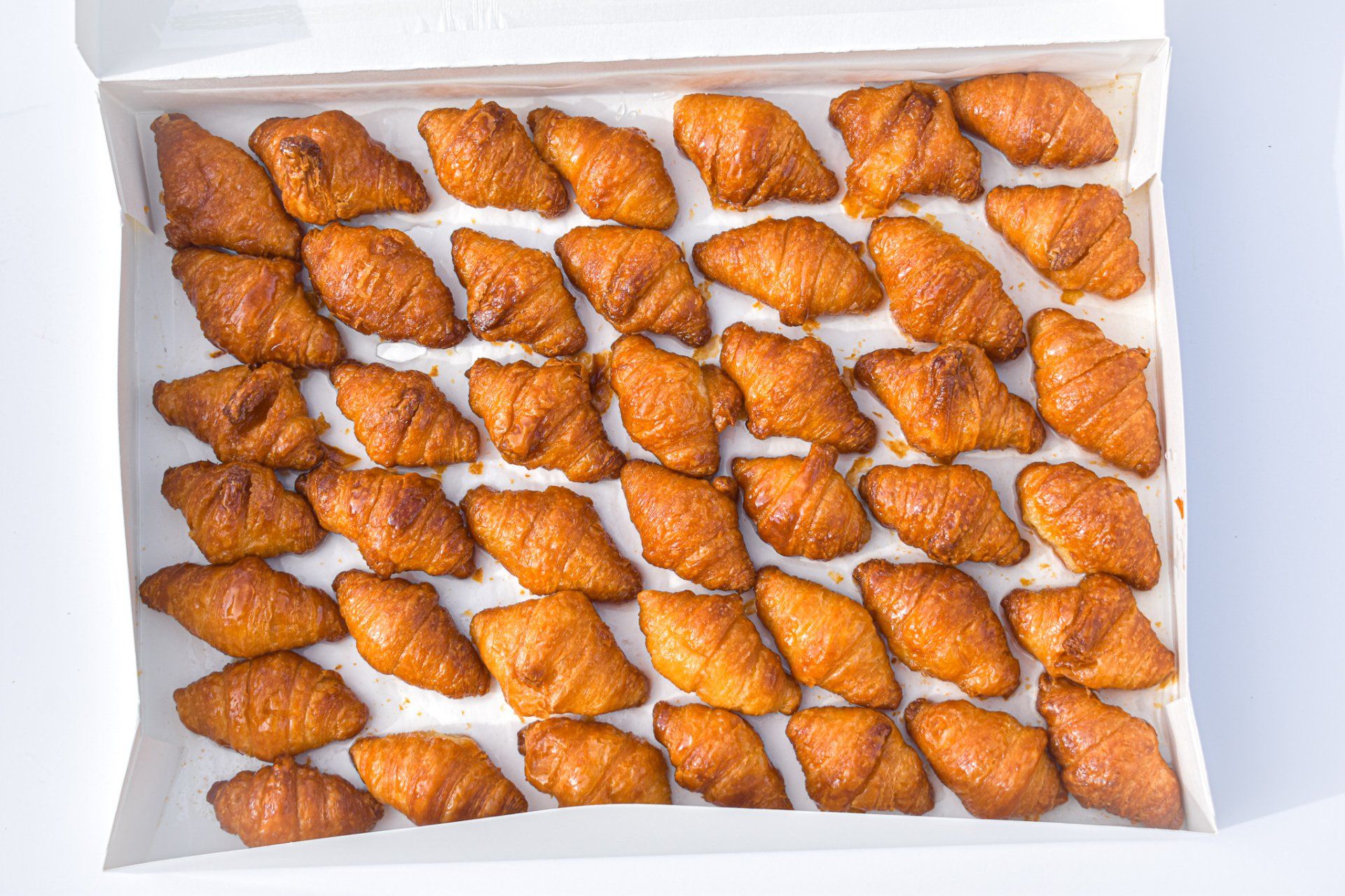 The picture shows 35 mini croissants filled with glazed