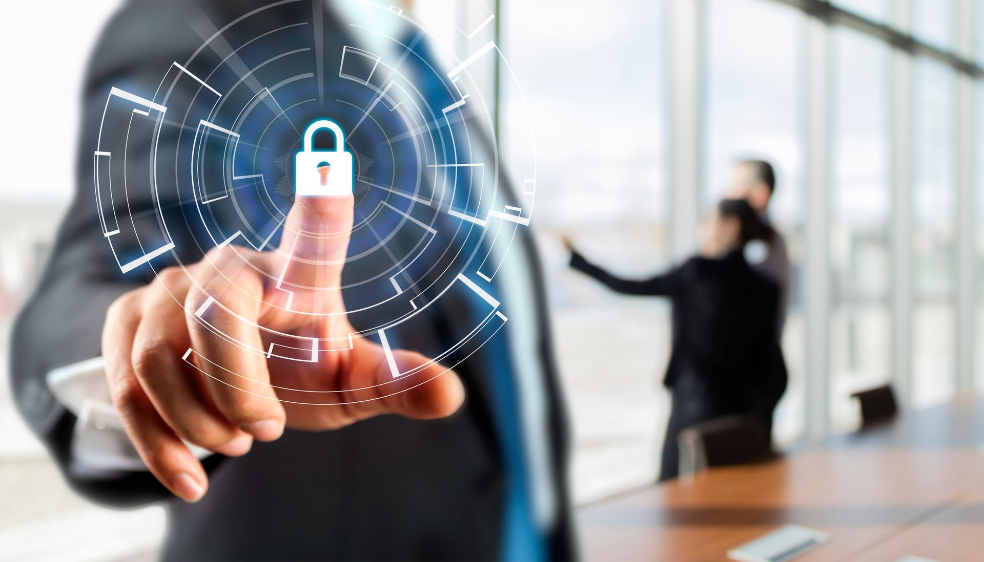 A person is pressing a button on a security system.