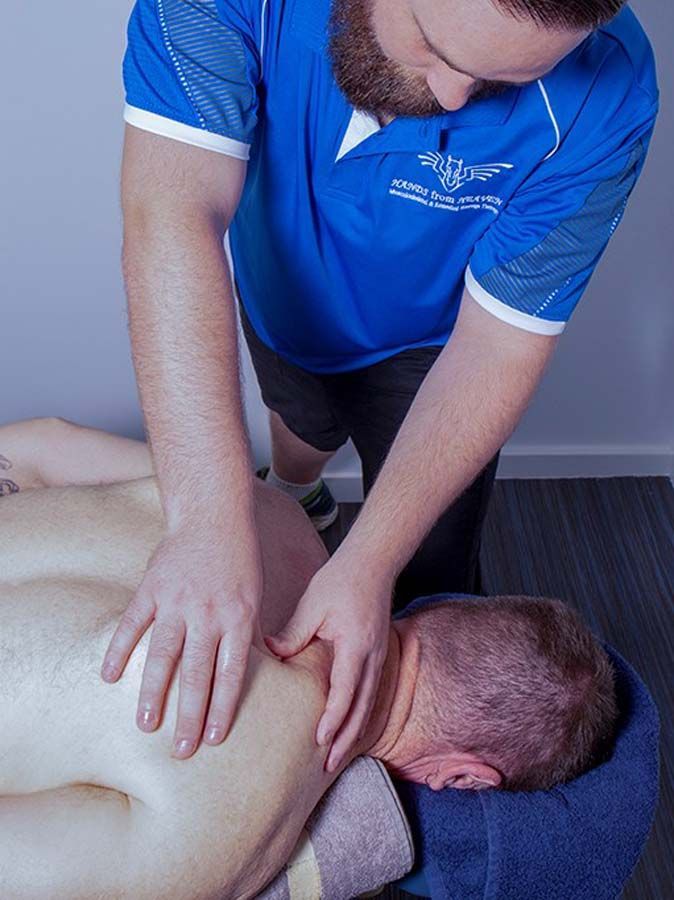A Man Is Getting A Massage From Jacob – Chermside, QLD - Hands From Heaven Remedial Therapy Clinic