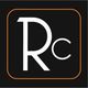 Black square logo with orange border and white “Rc” letters inside