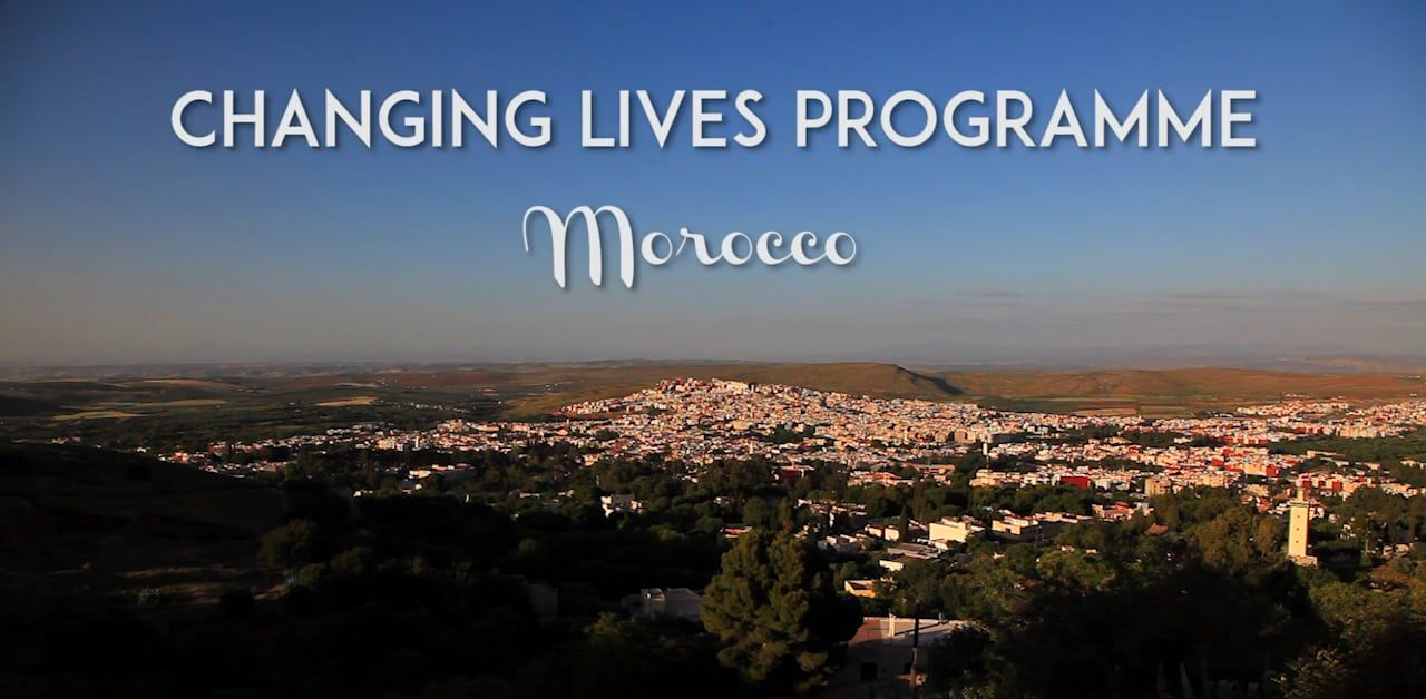 Scenic view of a city in Morocco with text overlay: 