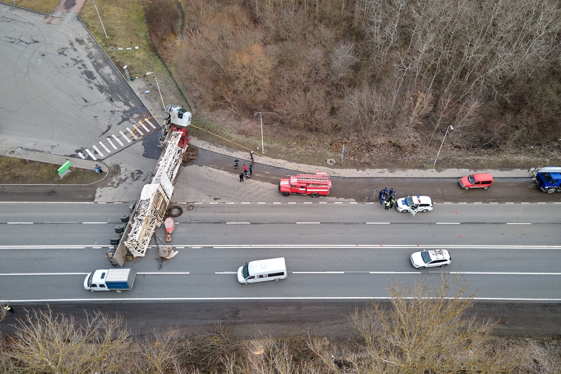 An aerial view of a truck that has fallen off the road.