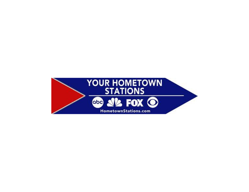 Blue and red “Your Hometown Stations” logo with ABC, NBC, and FOX icons