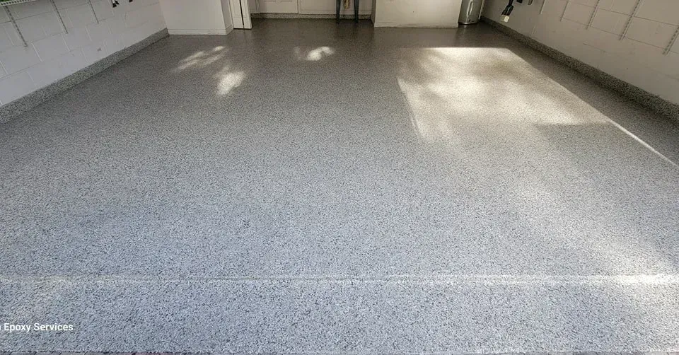 Gray speckled epoxy garage floor.