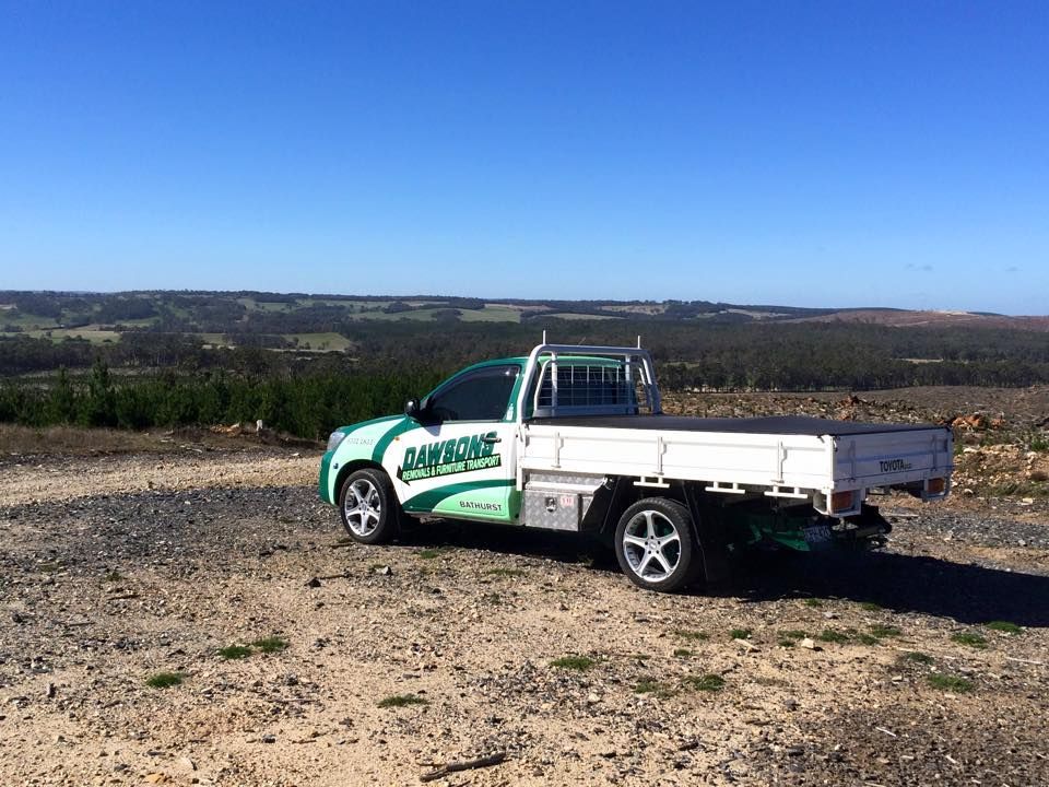 Green And White Pickup Truck With Company Logo — Dawson's Removals In Dubbo, NSW